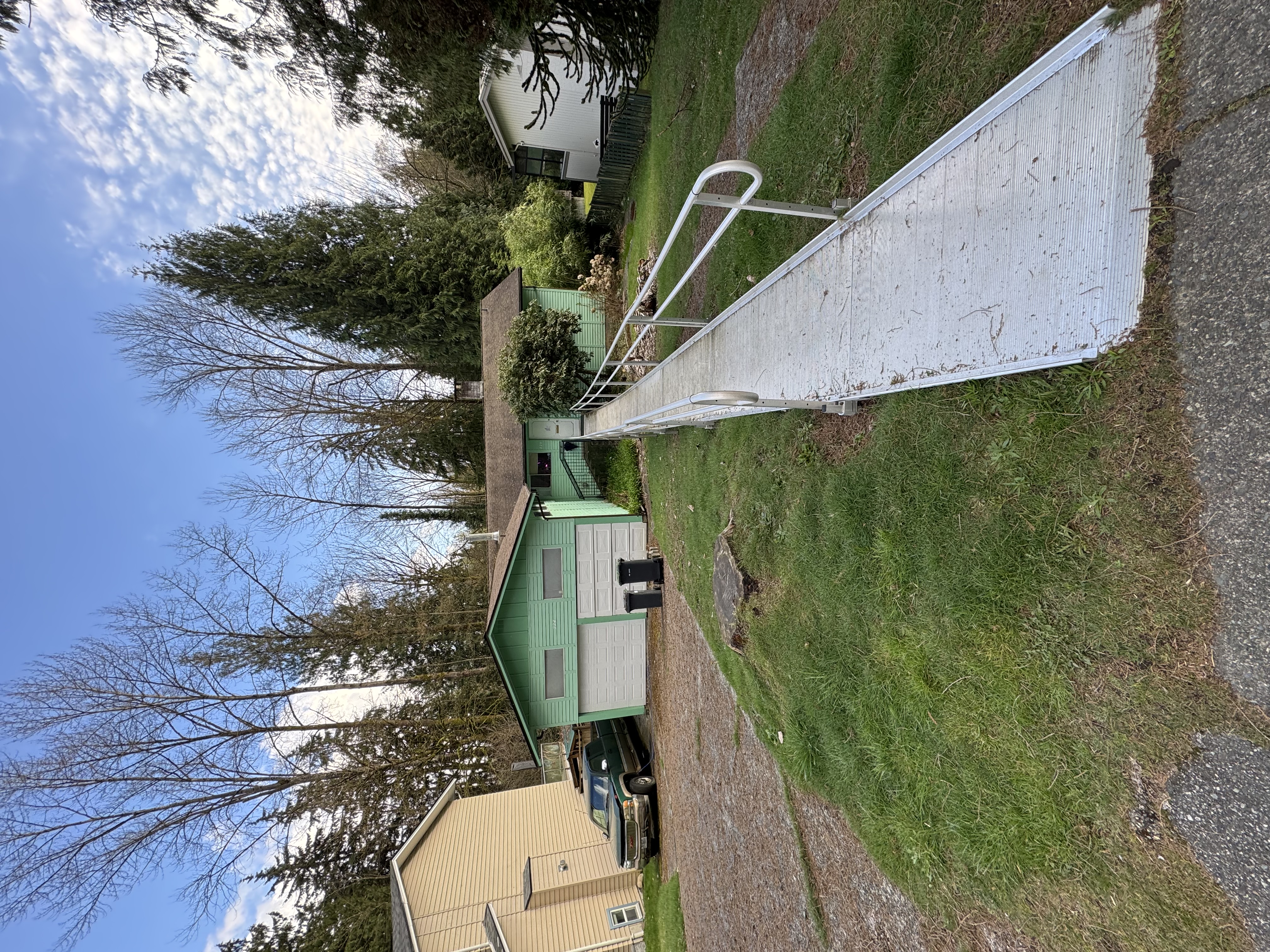 Long inclined accessibility ramp modification on neighbourhood rancher